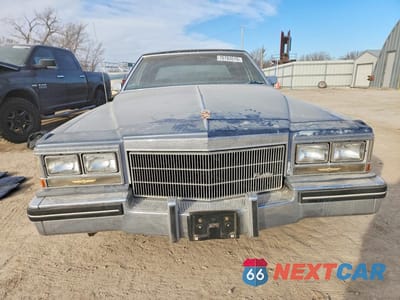 Piąte zdjęcie samochodu w środku: 1984 CADILLAC DEVILLE VIN:1G6AM6986E9043381 - miniatura