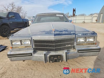 Piąte zdjęcie samochodu w środku: 1984 CADILLAC DEVILLE VIN:1G6AM6986E9043381 - miniatura