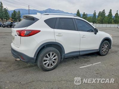 Trzecie zdjęcie samochodu z tyłu: 2016 MAZDA CX-5 TOURING VIN:JM3KE2CY0G0685772 - miniatura