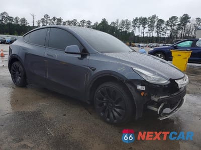 Czwarte zdjęcie samochodu z boku: 2022 TESLA MODEL Y VIN:7SAYGDEE0NA005735 - miniatura