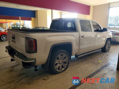 Trzecie zdjęcie samochodu z tyłu: 2018 GMC SIERRA K1500 DENALI VIN:3GTU2PEJ0JG458429 - miniatura