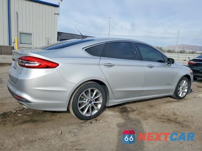 Trzecie zdjęcie samochodu z tyłu: 2017 FORD FUSION SE HYBRID VIN:3FA6P0LU8HR163677 - miniatura