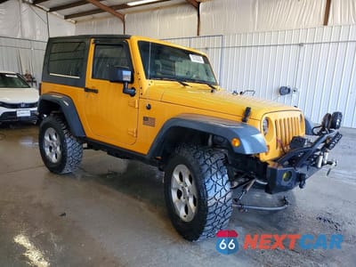 Czwarte zdjęcie samochodu z boku: 2012 JEEP WRANGLER SPORT VIN:1C4AJWAG2CL123091 - miniatura