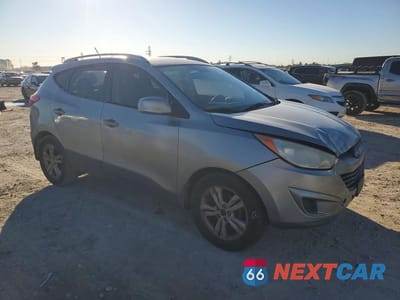 Czwarte zdjęcie samochodu z boku: 2010 HYUNDAI TUCSON GLS VIN:KM8JU3ACXAU072672 - miniatura