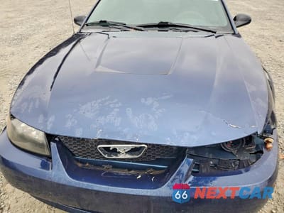 Zdjęcie 11 z 11 samochodu: 2003 FORD MUSTANG VIN:1FAFP404X3F352770 - miniatura