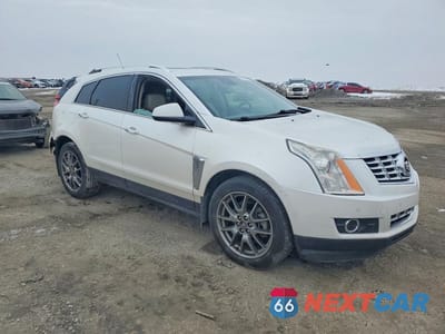 Czwarte zdjęcie samochodu z boku: 2015 CADILLAC SRX PERFORMANCE COLLECTION VIN:3GYFNCE37FS566376 - miniatura