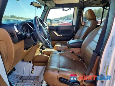 Zdjęcie 7 z 14 samochodu: 2012 JEEP WRANGLER UNLIMITED SAHARA VIN:1C4HJWEG9CL279685 - miniatura