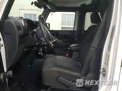Zdjęcie 7 z 14 samochodu: 2016 JEEP WRANGLER UNLIMITED SPORT VIN:1C4BJWDG0GL196370 - miniatura
