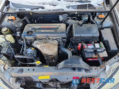 Zdjęcie 11 z 12 samochodu: 2003 TOYOTA CAMRY LE VIN:4T1BE30K73U672322 - miniatura