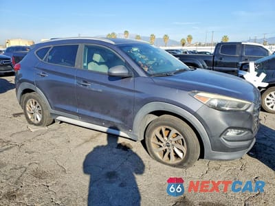 Czwarte zdjęcie samochodu z boku: 2018 HYUNDAI TUCSON SEL VIN:KM8J3CA4XJU616468 - miniatura