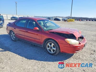 Czwarte zdjęcie samochodu z boku: 2001 FORD TAURUS SE VIN:1FAFP53U91A165340 - miniatura