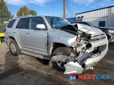 Czwarte zdjęcie samochodu z boku: 2010 TOYOTA 4RUNNER SR5 VIN:JTEBU5JRXA5006718 - miniatura