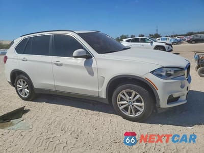 Czwarte zdjęcie samochodu z boku: 2015 BMW X5 SDRIVE35I VIN:5UXKR2C53F0H39228 - miniatura