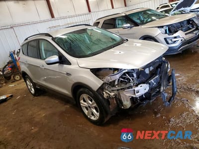 Czwarte zdjęcie samochodu z boku: 2016 FORD ESCAPE SE VIN:1FMCU0G72GUA55844 - miniatura