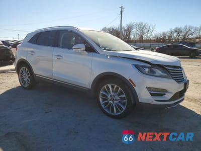 Czwarte zdjęcie samochodu z boku: 2015 LINCOLN MKC VIN:5LMCJ1A96FUJ20943 - miniatura