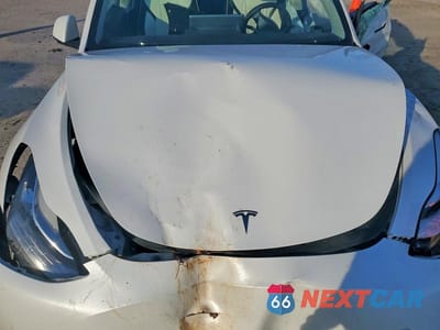 Zdjęcie 12 z 13 samochodu: 2022 TESLA MODEL Y VIN:7SAYGDEE3NF461716 - miniatura