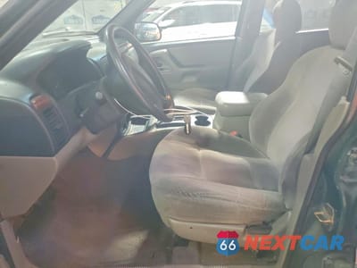 Zdjęcie 7 z 14 samochodu: 1999 JEEP GRAND CHEROKEE LAREDO VIN:1J4G258S3XC724263 - miniatura