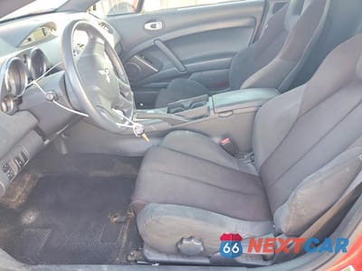 Zdjęcie 7 z 12 samochodu: 2009 MITSUBISHI ECLIPSE SPYDER GS VIN:4A3AL25F19E030853 - miniatura