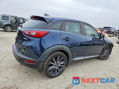 Trzecie zdjęcie samochodu z tyłu: 2018 MAZDA CX-3 GRAND TOURING VIN:JM1DKFD7XJ0310681 - miniatura