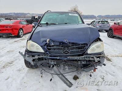 Piąte zdjęcie samochodu w środku: 2002 MERCEDES-BENZ ML 320 VIN:4JGAB54E92A348325 - miniatura