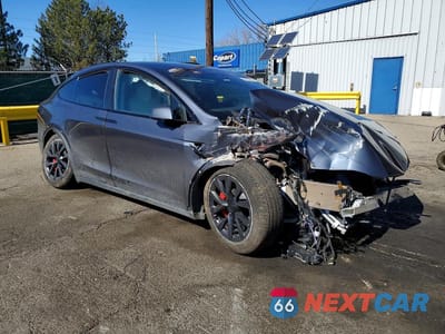Czwarte zdjęcie samochodu z boku: 2023 TESLA MODEL X VIN:7SAXCBE69PF412575 - miniatura