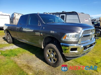 Czwarte zdjęcie samochodu z boku: 2014 RAM 3500 SLT VIN:3C63R3HL8EG293000 - miniatura