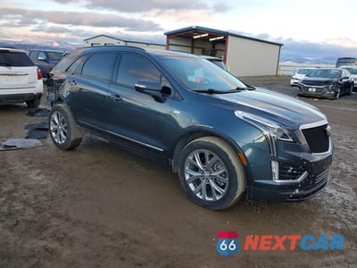 Czwarte zdjęcie samochodu z boku: 2021 CADILLAC XT5 SPORT VIN:1GYKNGRS1MZ105861 - miniatura