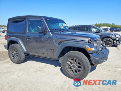 Czwarte zdjęcie samochodu z boku: 2024 JEEP WRANGLER SPORT VIN:1C4PJXAG4RW358499 - miniatura