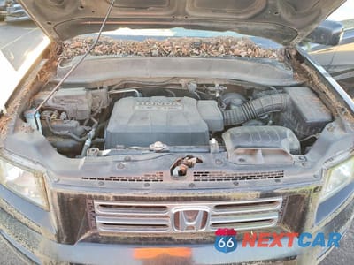 Zdjęcie 11 z 12 samochodu: 2006 HONDA RIDGELINE RTL VIN:2HJYK16516H549213 - miniatura