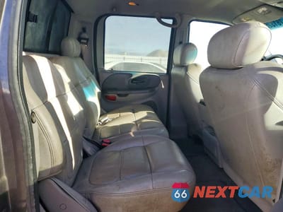 Zdjęcie 10 z 12 samochodu: 2002 FORD F150 SUPERCREW VIN:1FTRW08L32KC49808 - miniatura
