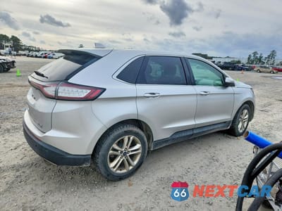 Trzecie zdjęcie samochodu z tyłu: 2015 FORD EDGE TITANIUM VIN:2FMTK4K99FBB32087 - miniatura