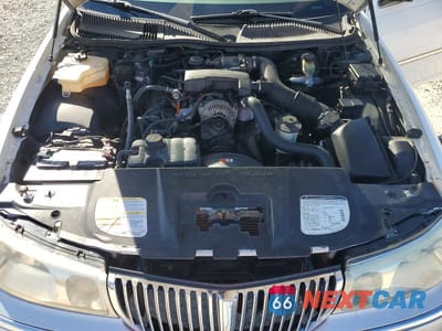 Zdjęcie 11 z 13 samochodu: 2000 LINCOLN TOWN CAR SIGNATURE VIN:1LNHM82W6YY887586 - miniatura