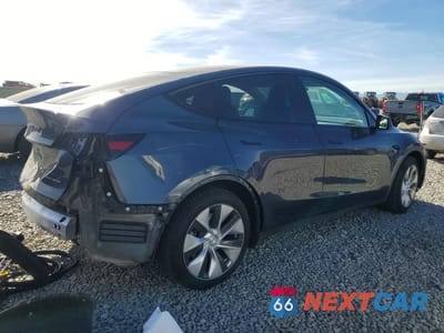 Trzecie zdjęcie samochodu z tyłu: 2023 TESLA MODEL Y VIN:7SAYGAEE5PF810862 - miniatura