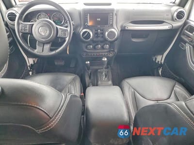 Zdjęcie 8 z 12 samochodu: 2015 JEEP WRANGLER UNLIMITED SAHARA VIN:1C4BJWEGXFL742668 - miniatura