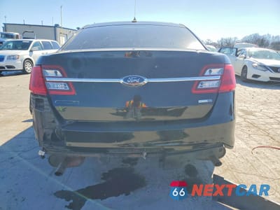 Zdjęcie 6 z 14 samochodu: 2014 FORD TAURUS POLICE INTERCEPTOR VIN:1FAHP2MK3EG120210 - miniatura