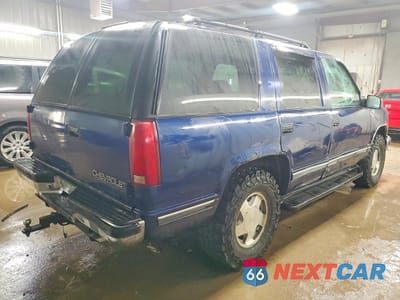 Trzecie zdjęcie samochodu z tyłu: 1999 CHEVROLET TAHOE K1500 VIN:1GNEK13R2XJ354176 - miniatura