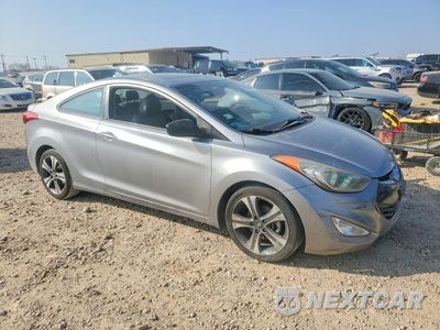 Czwarte zdjęcie samochodu z boku: 2013 HYUNDAI ELANTRA COUPE SE VIN:KMHDH6AEXDU006423 - miniatura