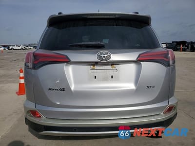 Zdjęcie 6 z 13 samochodu: 2018 TOYOTA RAV4 XLE VIN:JTMWFREVXJJ163185 - miniatura