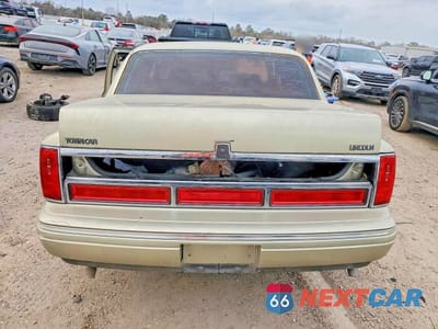 Zdjęcie 6 z 13 samochodu: 1997 LINCOLN TOWN CAR SIGNATURE VIN:1LNLM82W0VY726334 - miniatura