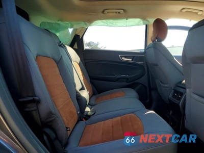 Zdjęcie 11 z 13 samochodu: 2018 FORD EDGE SEL VIN:2FMPK4J94JBB78079 - miniatura