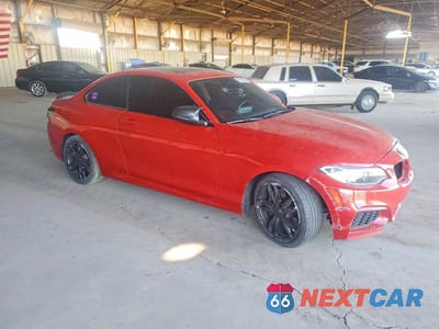Czwarte zdjęcie samochodu z boku: 2016 BMW M235I VIN:WBA1J7C55GV359453 - miniatura