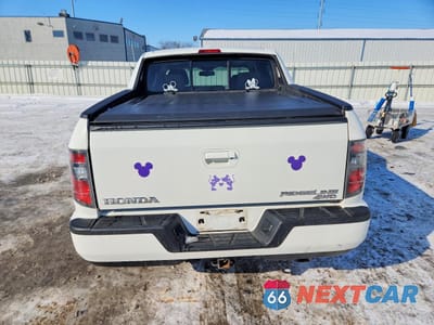 Zdjęcie 6 z 12 samochodu: 2014 HONDA RIDGELINE RTL VIN:5FPYK1F54EB001920 - miniatura