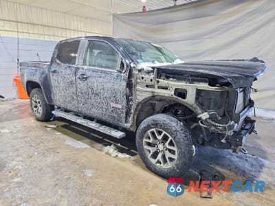 Czwarte zdjęcie samochodu z boku: 2019 GMC CANYON ALL TERRAIN VIN:1GTG6FEN6K1247766 - miniatura