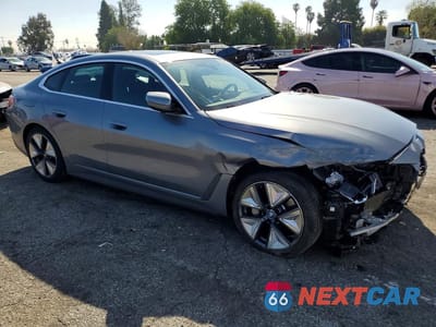 Czwarte zdjęcie samochodu z boku: 2024 BMW I4 EDRIVE 35 VIN:WBY43AW03RFS84206 - miniatura