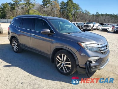 Czwarte zdjęcie samochodu z boku: 2016 HONDA PILOT ELITE VIN:5FNYF6H04GB059024 - miniatura