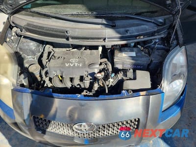 Zdjęcie 11 z 12 samochodu: 2007 TOYOTA YARIS BASE VIN:JTDJT923875137806 - miniatura