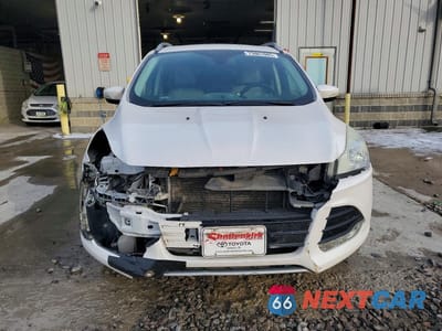 Piąte zdjęcie samochodu w środku: 2016 FORD ESCAPE TITANIUM VIN:1FMCU9J94GUC42484 - miniatura