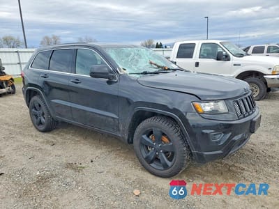 Czwarte zdjęcie samochodu z boku: 2015 JEEP GRAND CHEROKEE LAREDO VIN:1C4RJFAG2FC770565 - miniatura