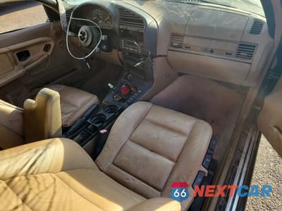 Zdjęcie 8 z 11 samochodu: 1999 BMW 323 IC AUTOMATIC VIN:WBABJ8336XEM26019 - miniatura