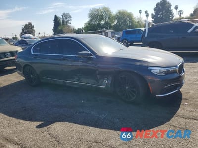 Czwarte zdjęcie samochodu z boku: 2018 BMW 740 I VIN:WBA7E2C57JG743361 - miniatura